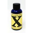 X Gold 24K front of bottle: cobalt-blue glass, black screw cap, gold label with a large black X wordmark